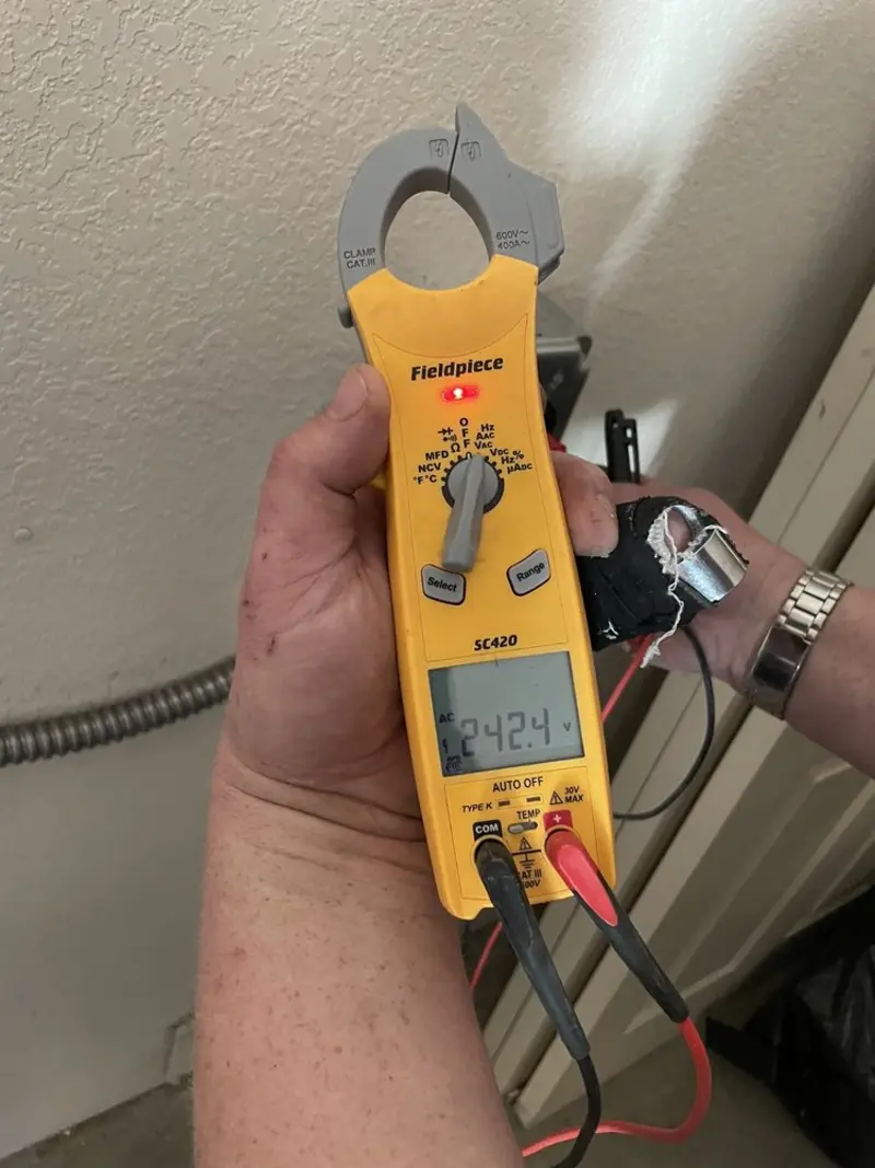 Voltage testing with clamp meter during Electrical Installation Services in Cherokee
